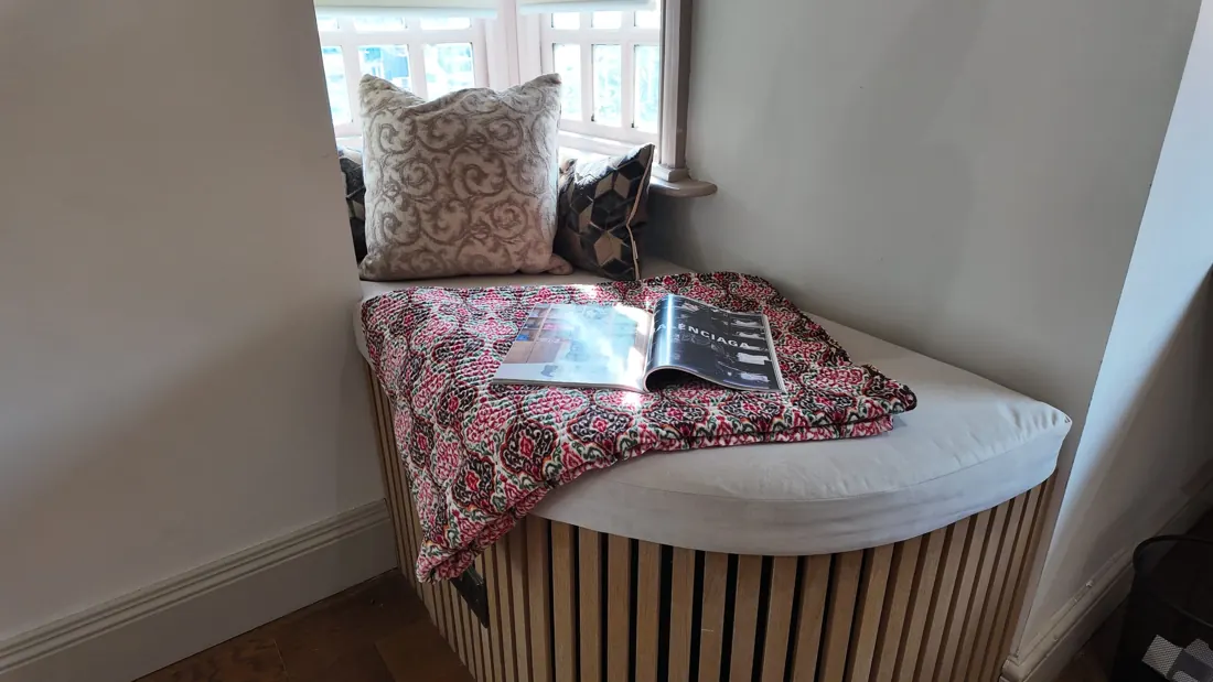 The window seat reading nook in a Dachshund Den bedroom