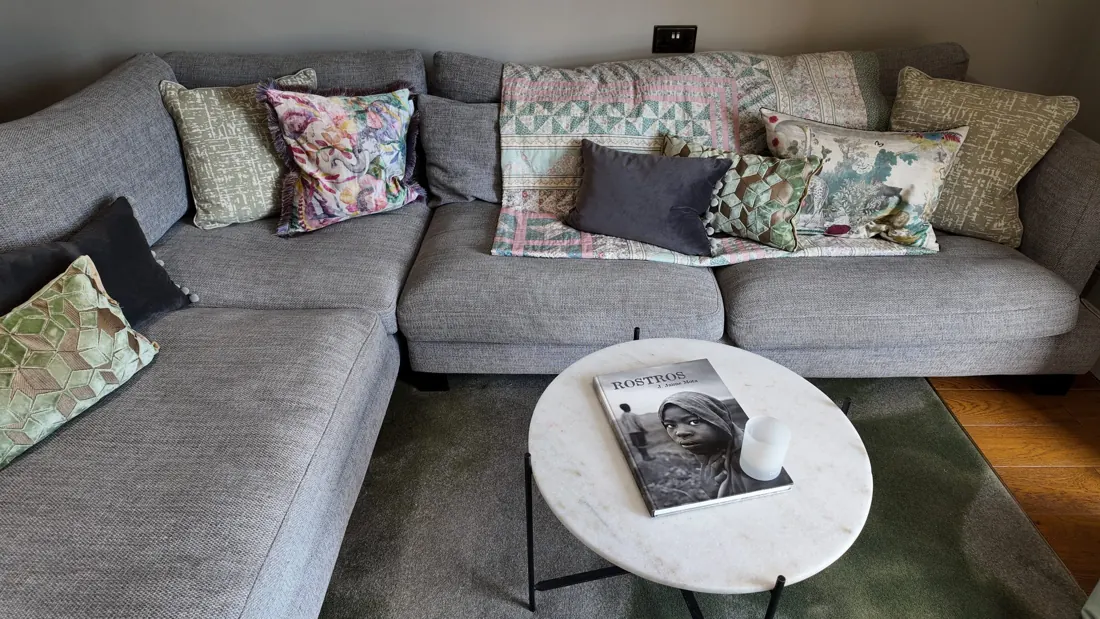 The sofa and marble coffee table in Dachshund Den