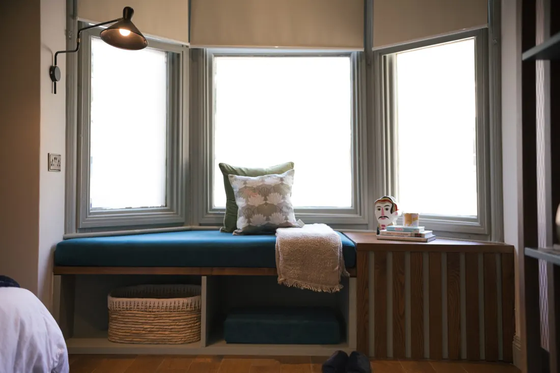 The bay window seat in a Mutt Mansion bedroom