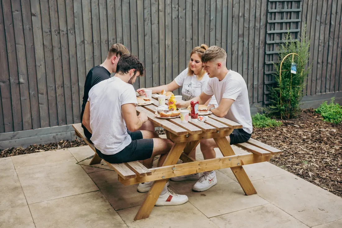 Eating outside in the Mutt Mansion garden