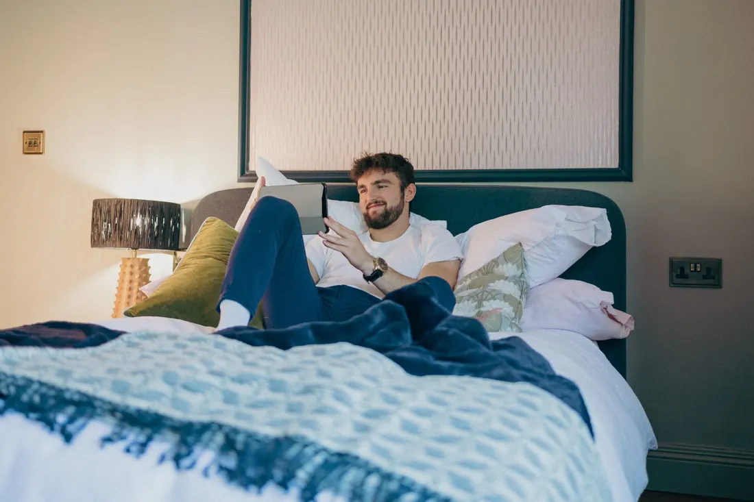 A tenant chilling in a Westie Warren bedroom